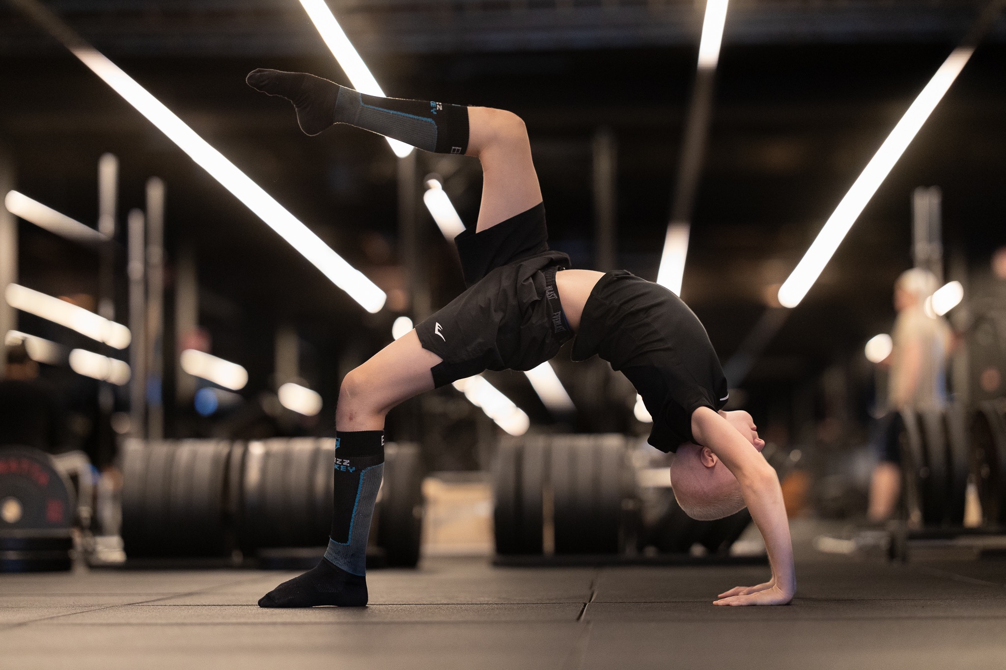 Athlete demonstrating strength and control in a single-leg bridge position