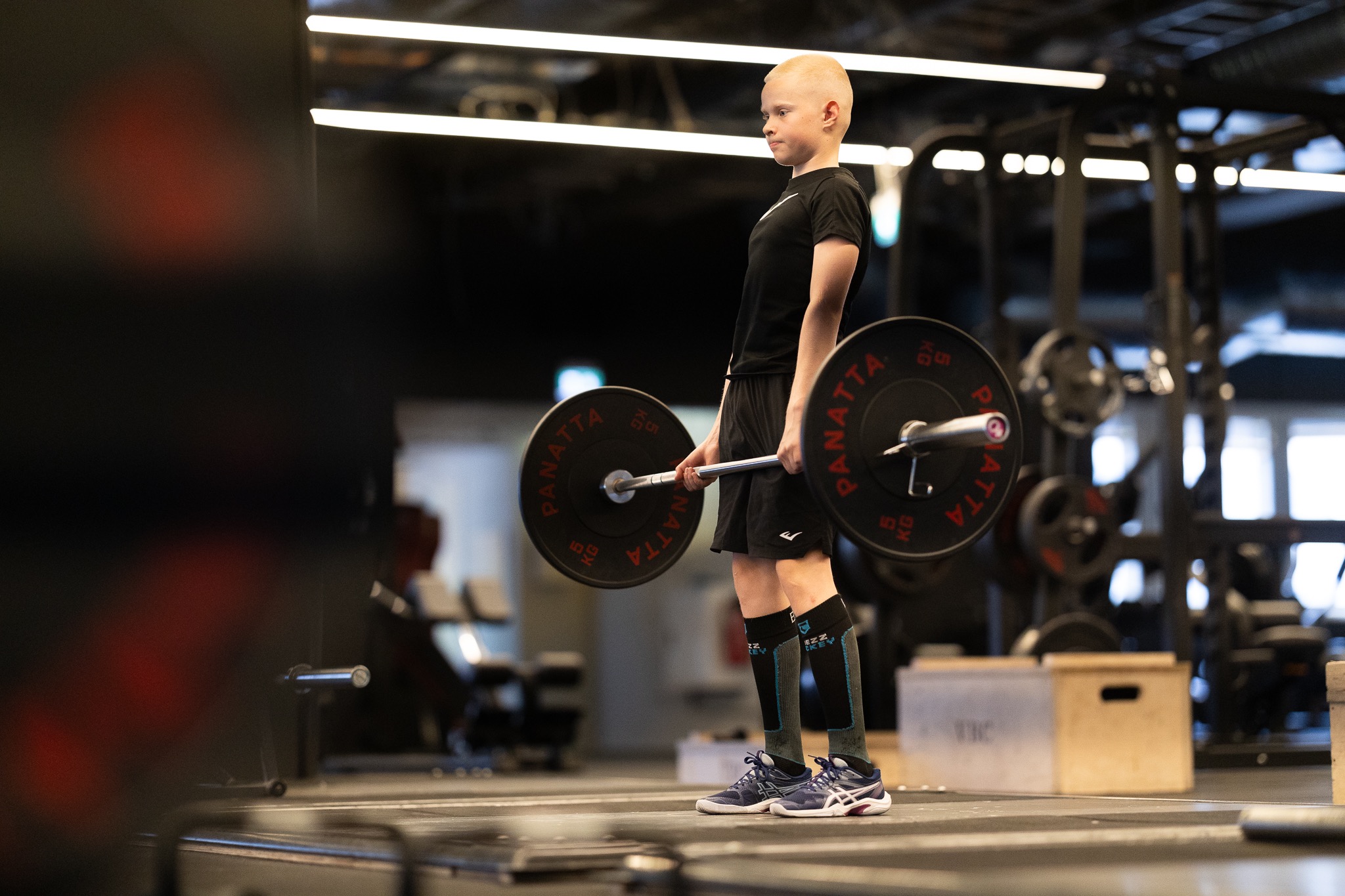 Athlete building strength with a barbell